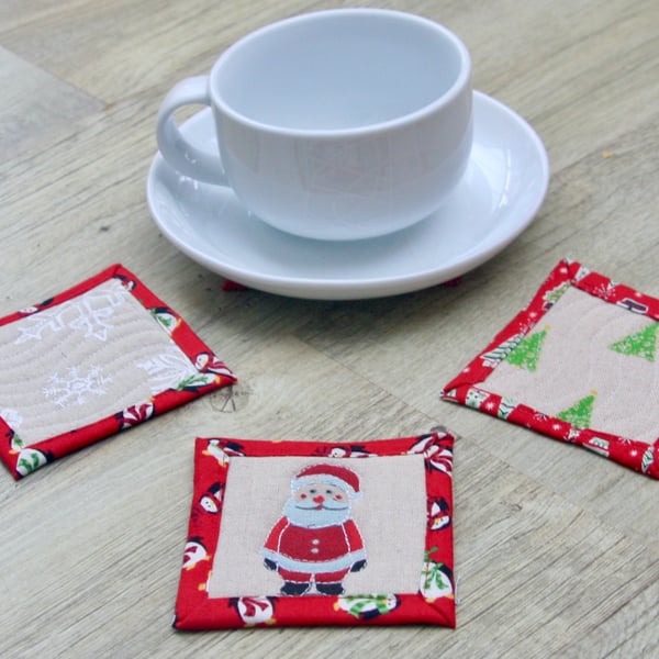 Set of Four Quilted Christmas Coasters with Santa, Snowmen, Trees and Snowflakes