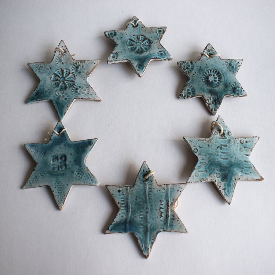 Set of Six Turquoise Ceramic Stars