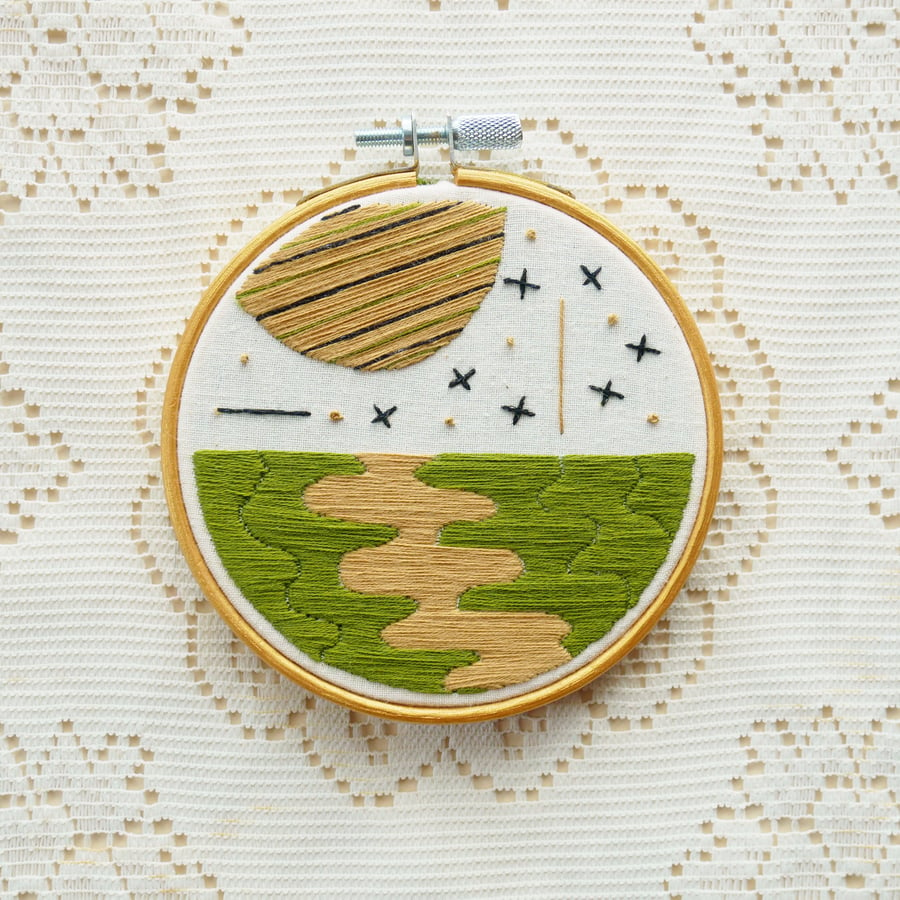 Space and Time 4 inch embroidered piece in Green, Black and Gold