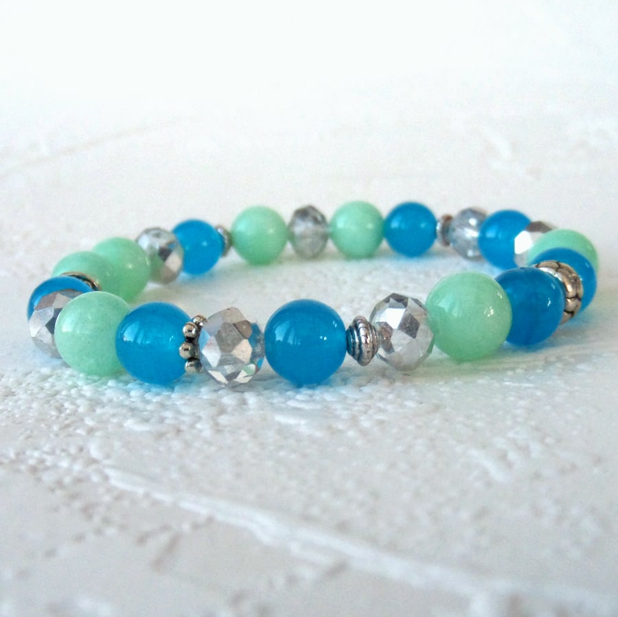 Handmade stretchy bracelet, with blue and pastel green jade