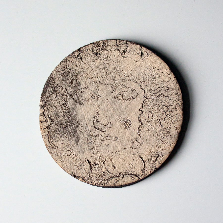 Black Clay Circle Tile with Subtle Face.