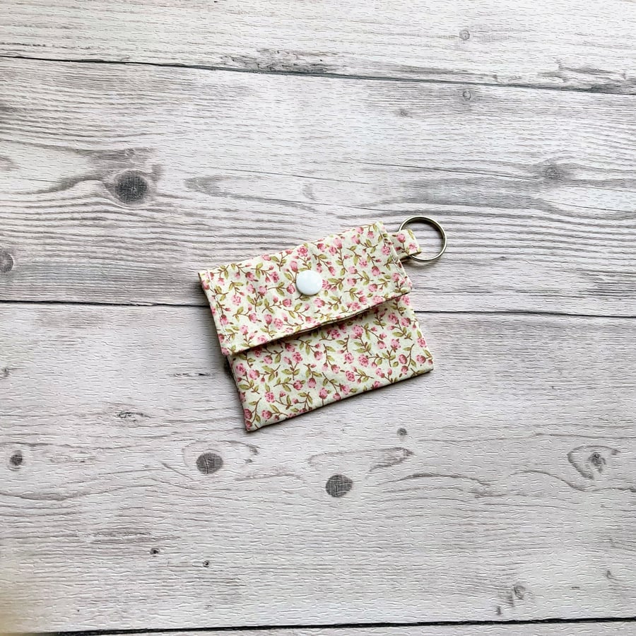 Cream and pink ditsy cotton round lip balm keychain. Fabric lipstick holder.