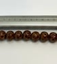 Handmade brown spotted lamp work glass beads - Image 2