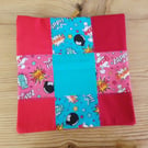Cushion cover in a blue and red cartoon theme with envelope closure.