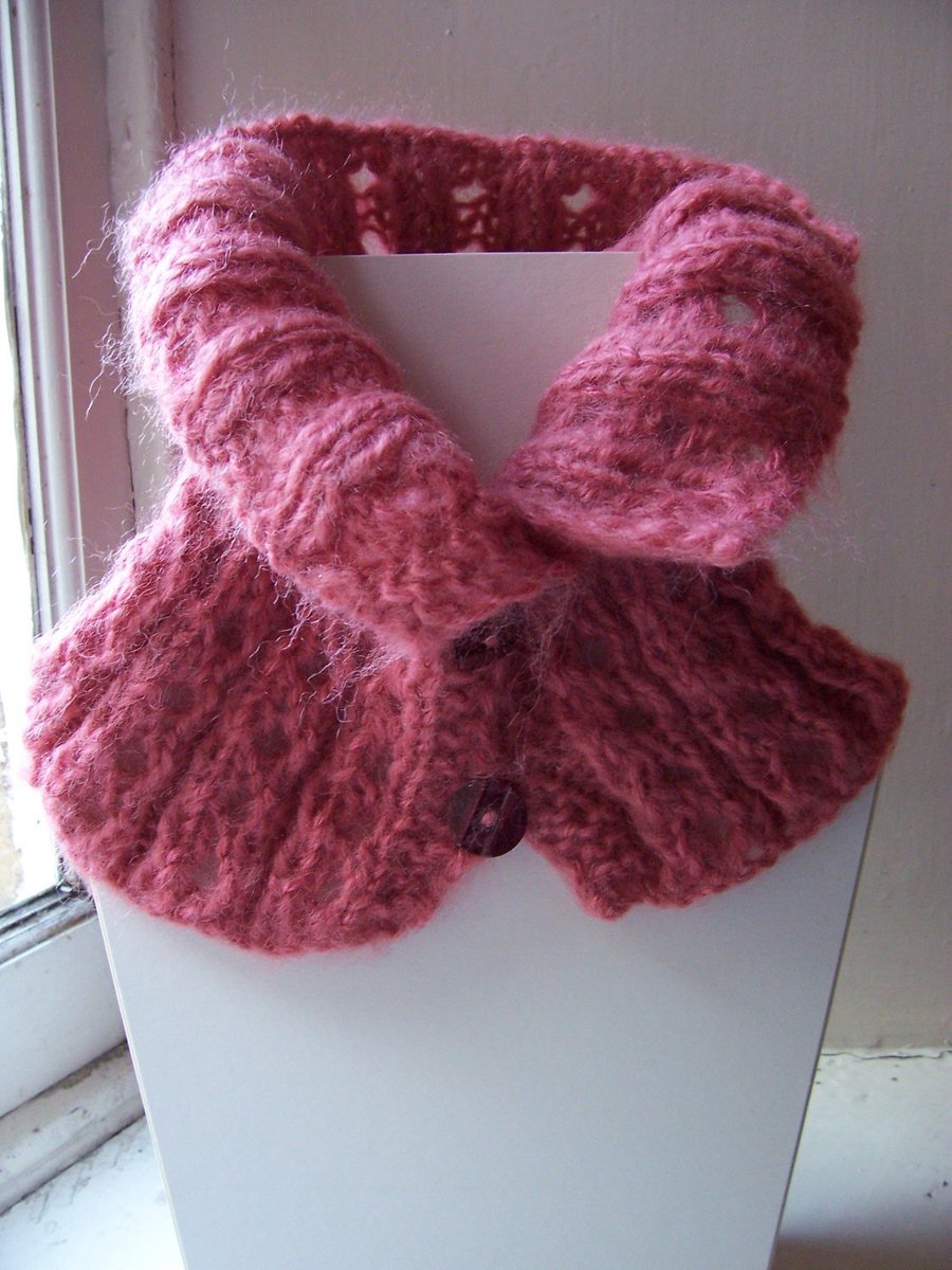 Hand knit eyelet button fastening neckwarmer in pink mohair