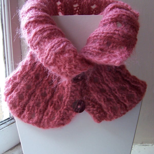 Hand knit eyelet button fastening neckwarmer in pink mohair