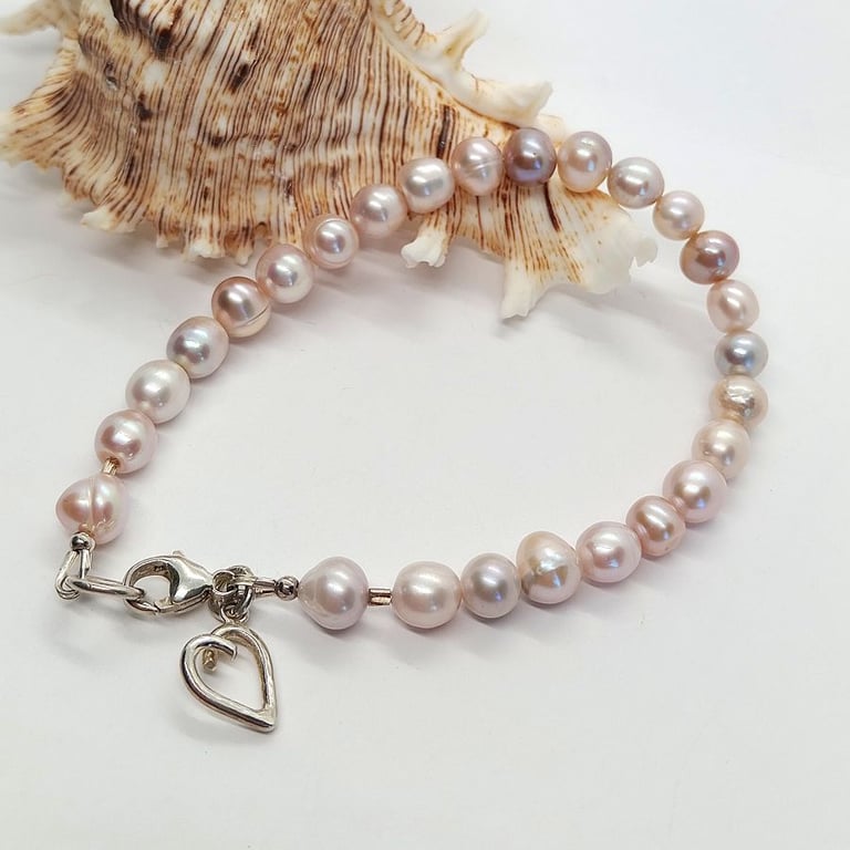 Freshwater pearl bracelet with silver heart charm natural minky tones