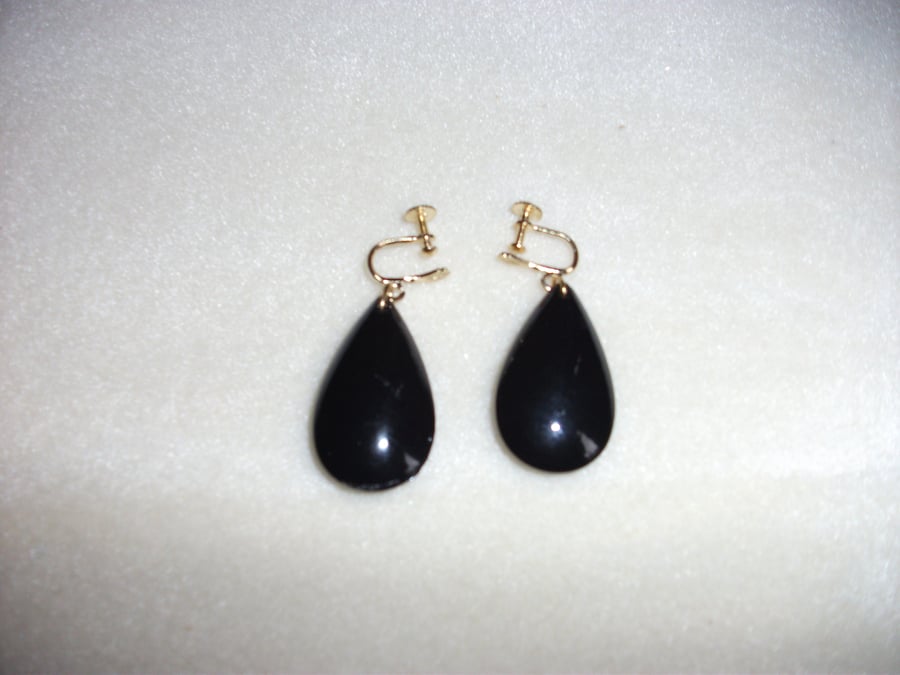 Solid Black Pear Drop shaped earrings with gold plate earscrews 