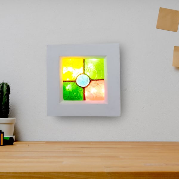 Illuminated stained glass wall art- nightlight has 6 hour timer.  Soft Ambient.