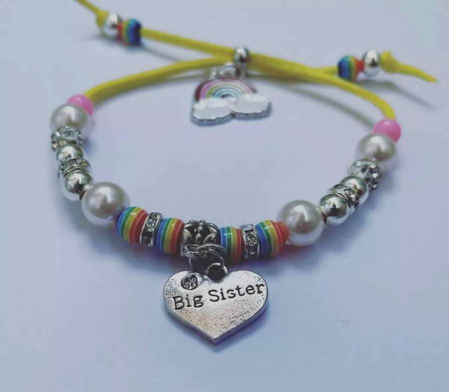 Big sister suede effect yellow corded bracelet rainbow charm bracelet 