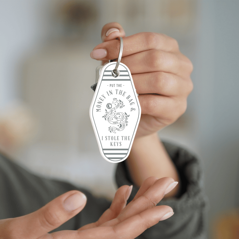 Money In The Bag - Floral Snake Keyring: Motel-style Keychain, Getaway Car