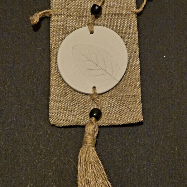 Beautiful handmade airdry clay diffuser wall hanger comes in jute gift bag 