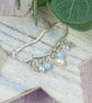 Sterling Silver Rain Cloud Necklace with Blue Gemstone Raindrops - Image 4