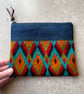 Repurposed tapestry and denim pouch