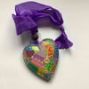 Multi coloured abstract wooden heart