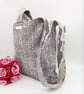 Reversible grey and patterned knot bag.  - Image 7