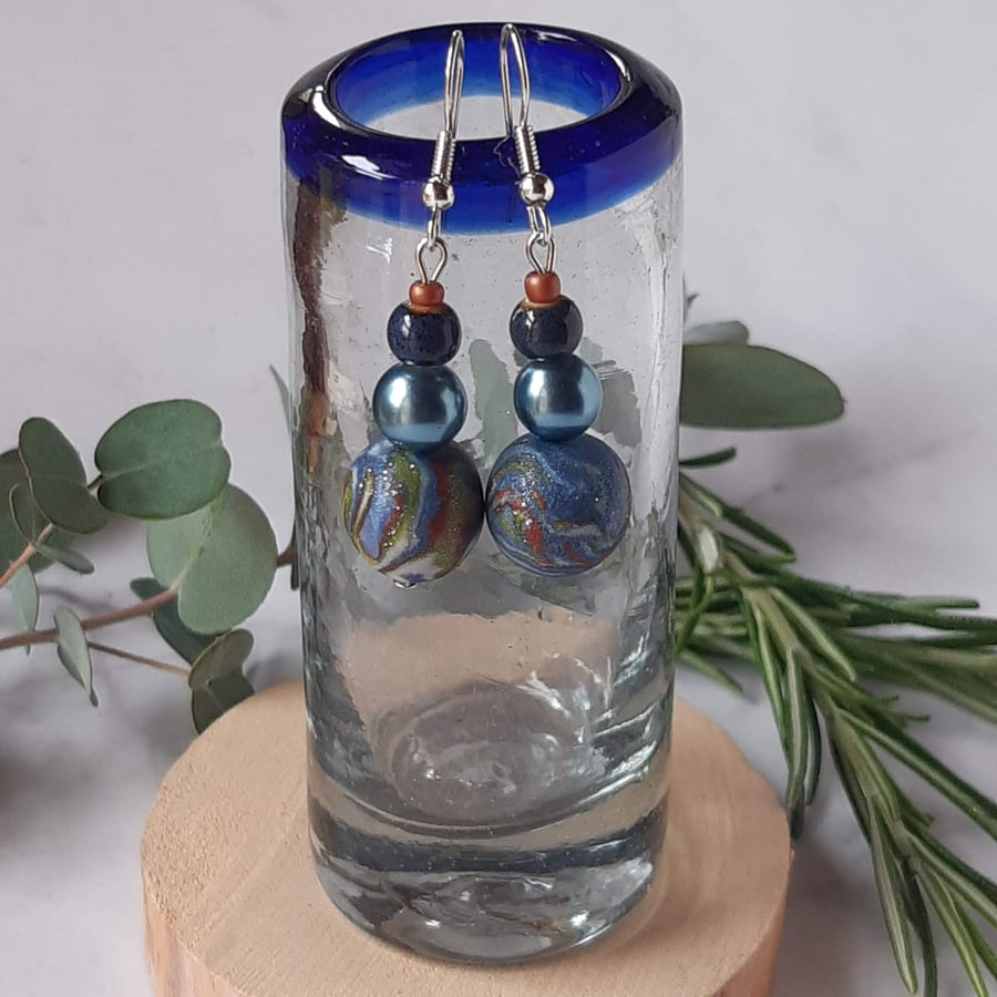 Handmade polymer clay dangly earrings in  blue, green and sienna mix  