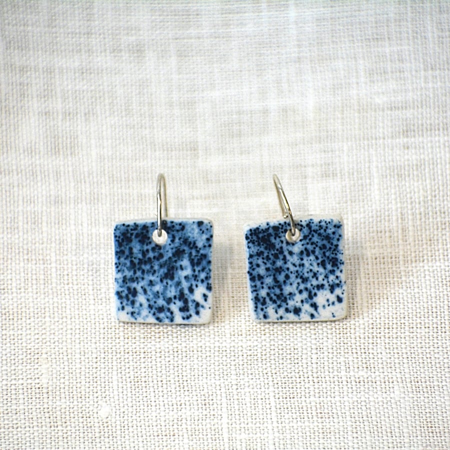 Square porcelain earrings with blue speckled detail