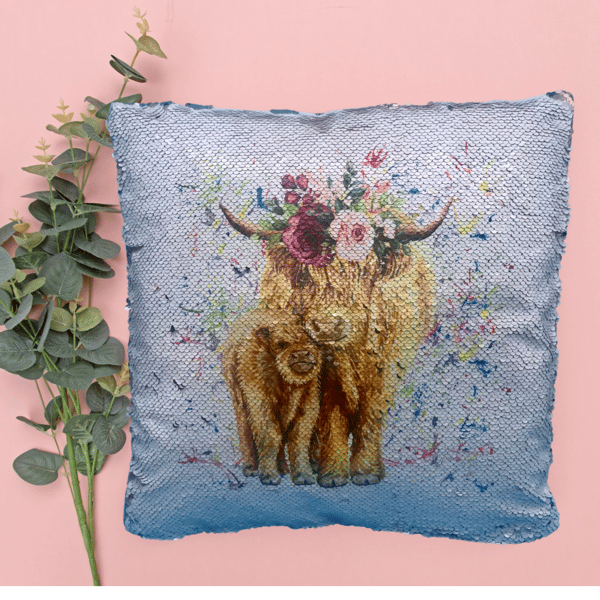 Sequin swipe and reveal cushion with highland cow