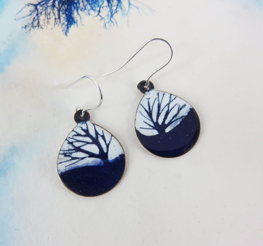 Navy and white oval teardrop dangle earrings in copper and enamel with trees