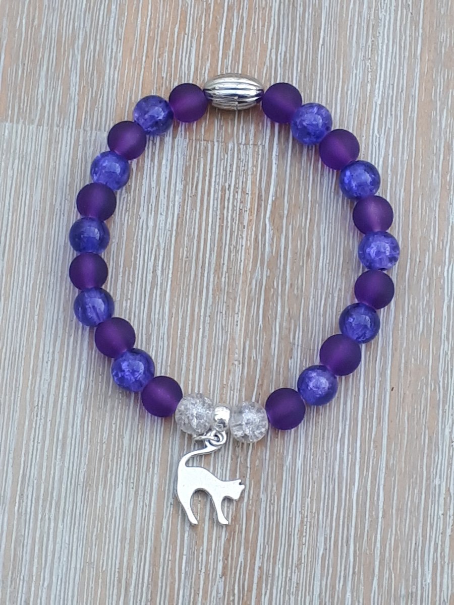 Purple bracelet with cat charm sold in aid of MK Cat Rescue