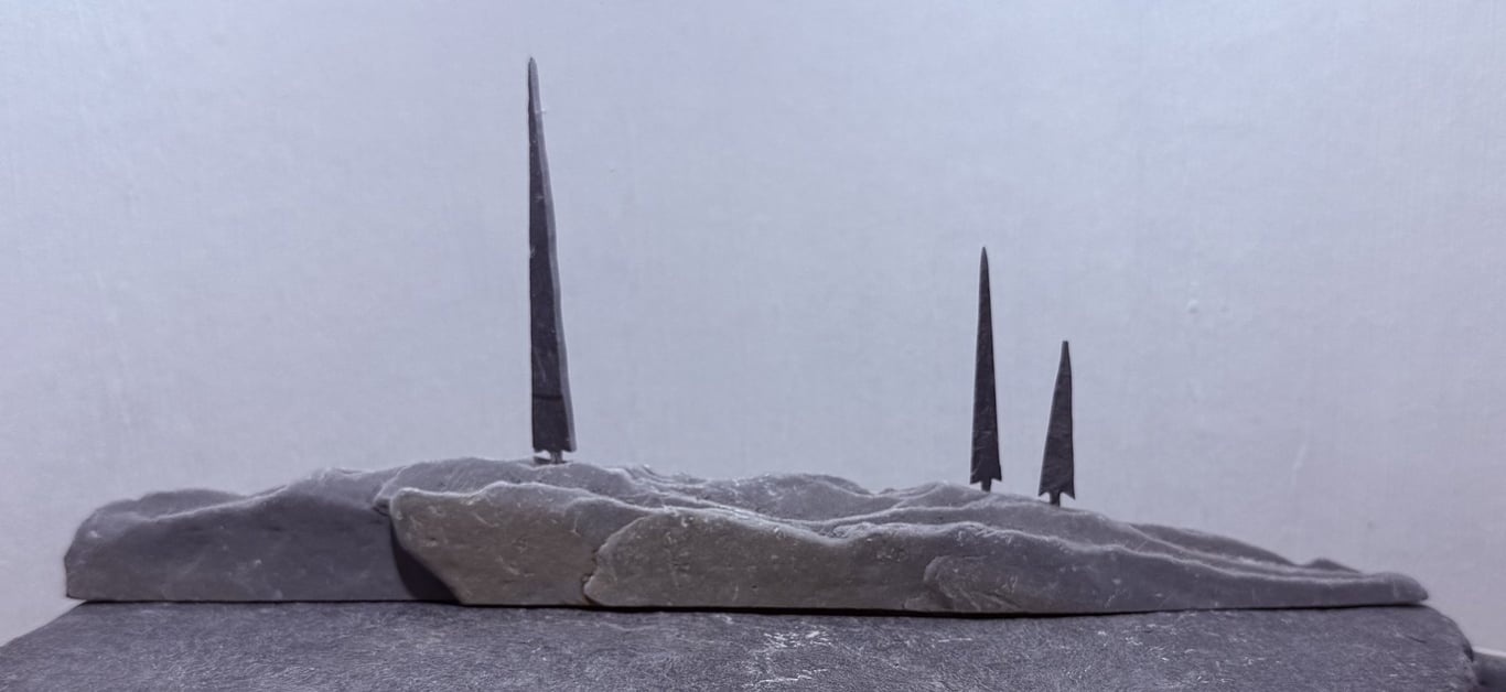Three Tall Tiny Stone Trees on Stone Hill