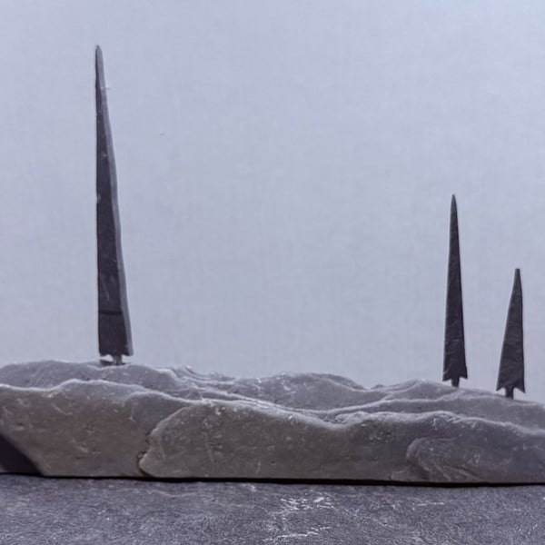 Three Tall Tiny Stone Trees on Stone Hill