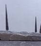 Three Tall Tiny Stone Trees on Stone Hill
