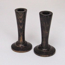 Ebonised candle holders