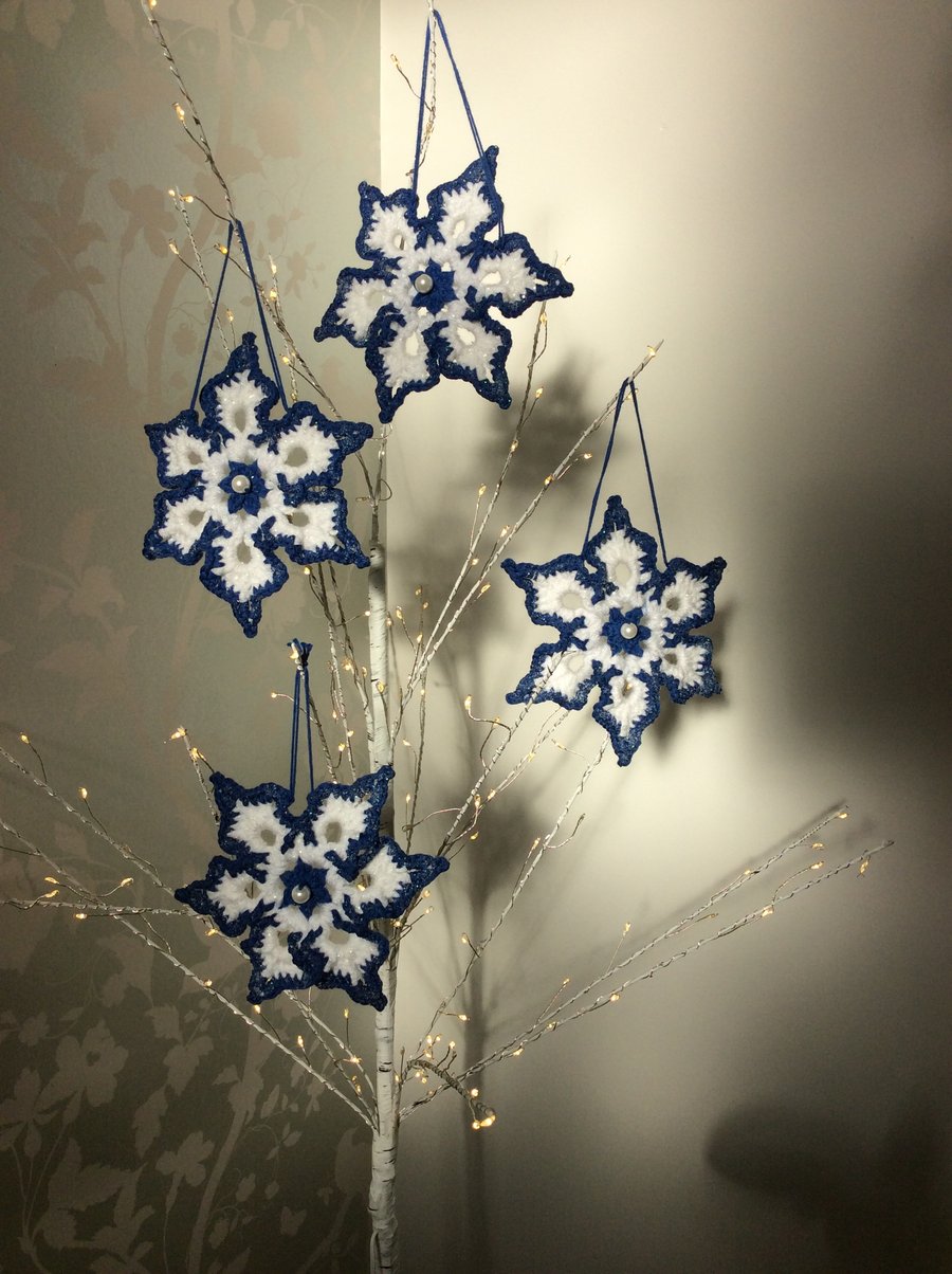 Sparkly white and blue snowflakes.