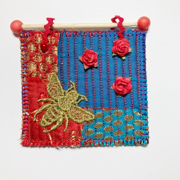 Bee with red roses, miniature quilted patchwork picture