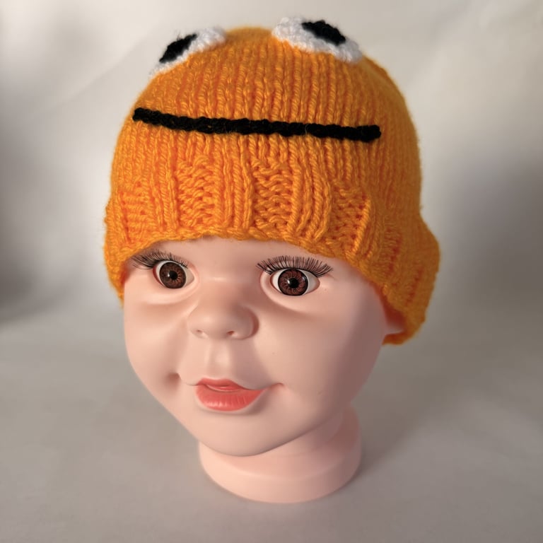 Childrens hand knitted smiley face hat