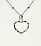 Small Sterling Silver Hammer Finished Heart Pendant Necklace - Image 1