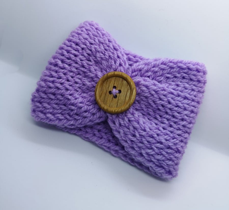 Handknitted lilac cup cosie