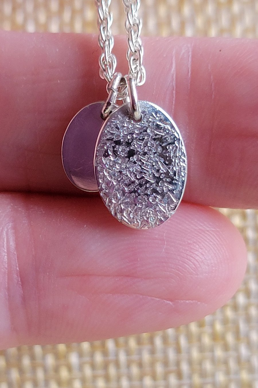 Sterling silver twin Oval pendants. 