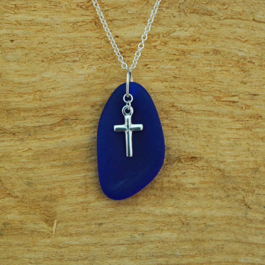Blue beach glass pendant with cross charm