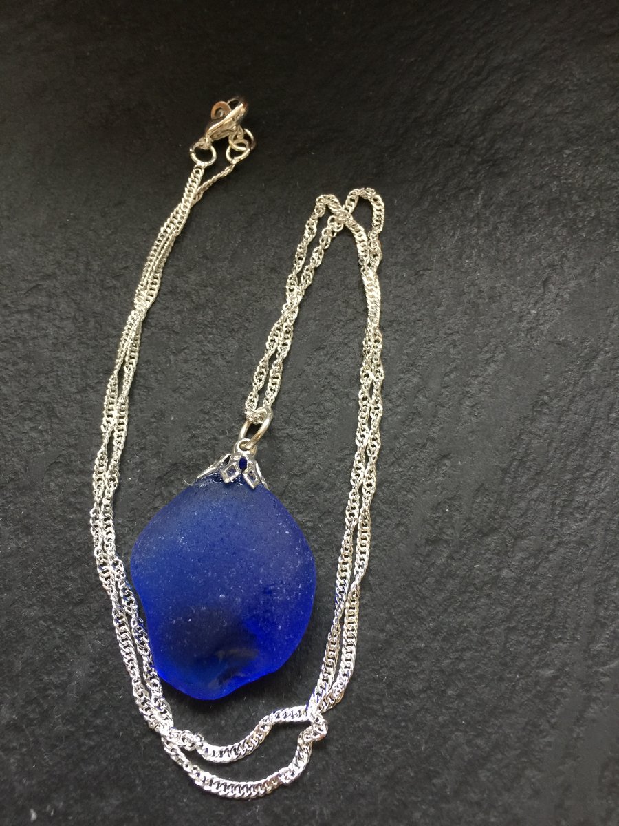 Silver plated necklace with deep blue coloured sea glass pendant