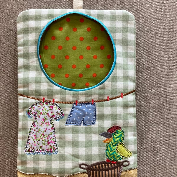Embroidered fabric peg bag. 