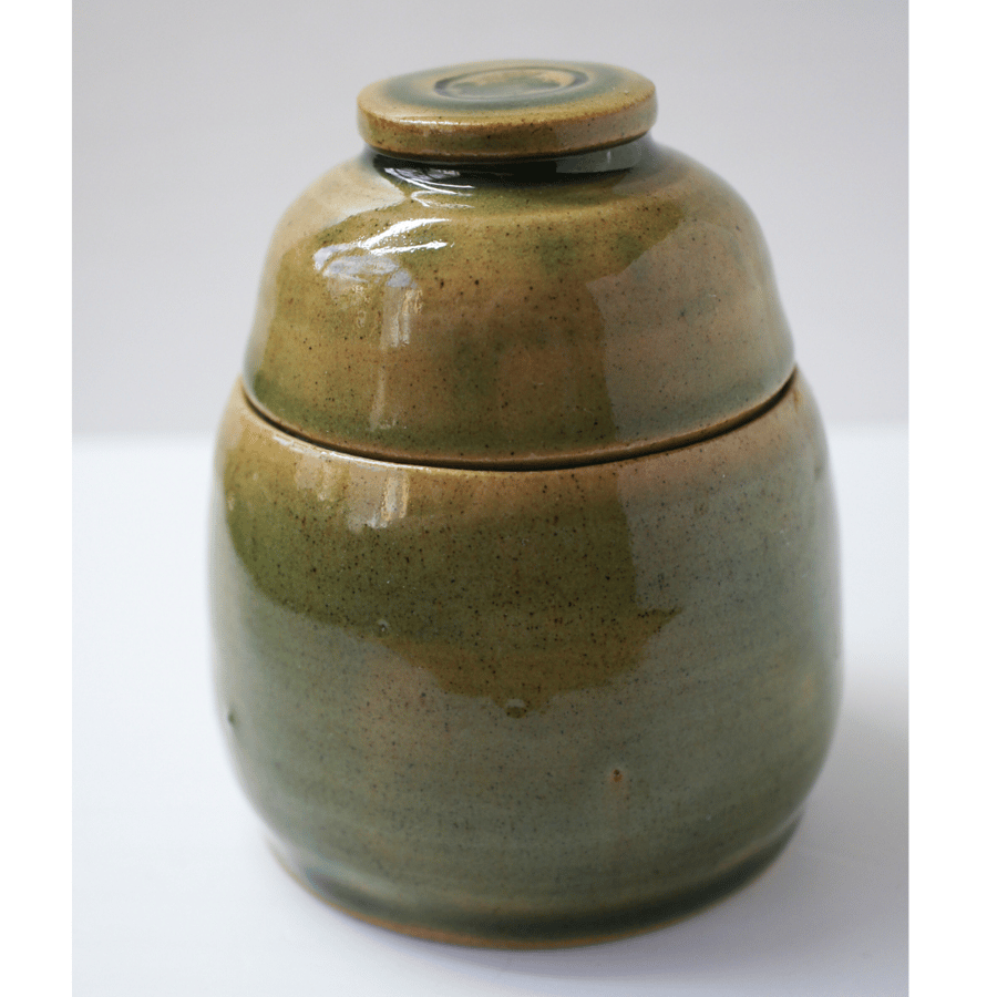 Pear-shaped green glazed trinket pot with lid 11cm x 8cm approx