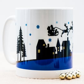 Blue Xmas Themed Coffee Mug - Father Christmas Eve Santa Sleigh Reindeer Houses