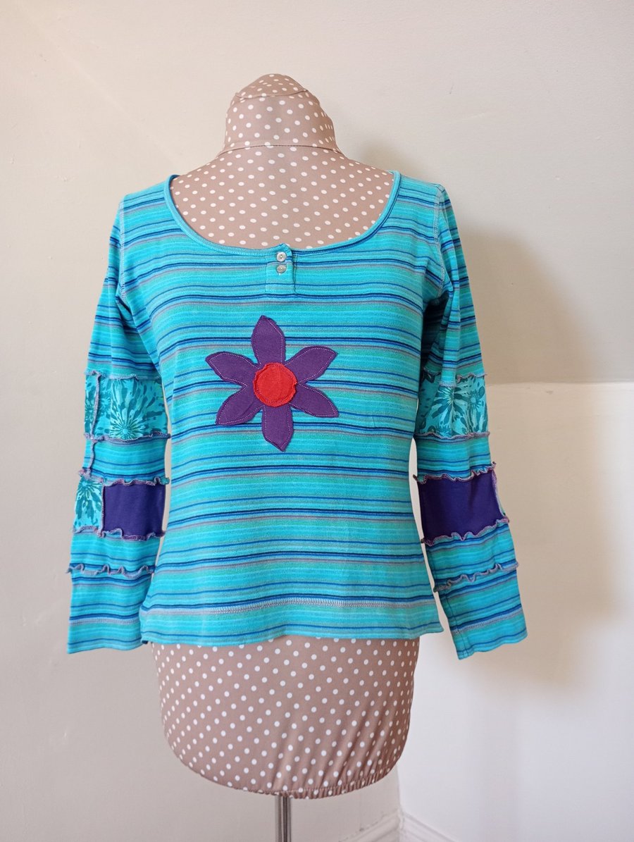 Striped patchwork top with long sleeves and flower applique