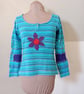 Striped patchwork top with long sleeves and flower applique