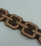 Pyrographed leather bracelet featuring chain design - Image 4
