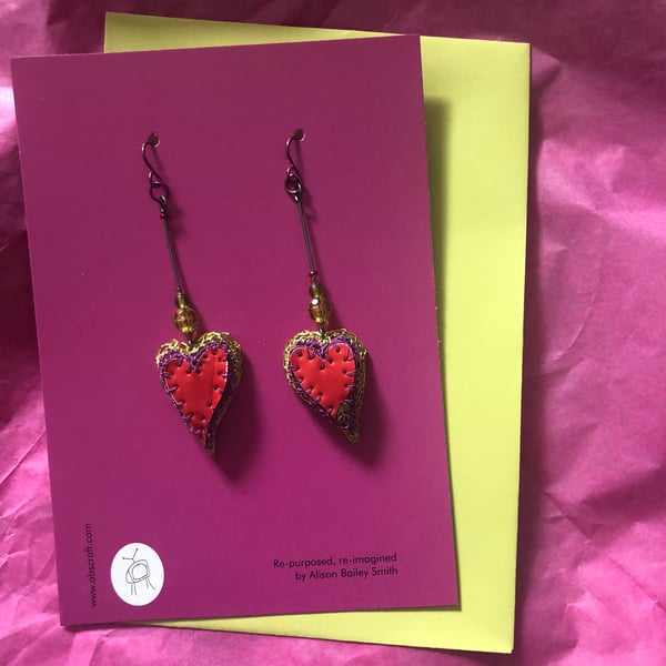 Dangly heart earrings of recycled materials