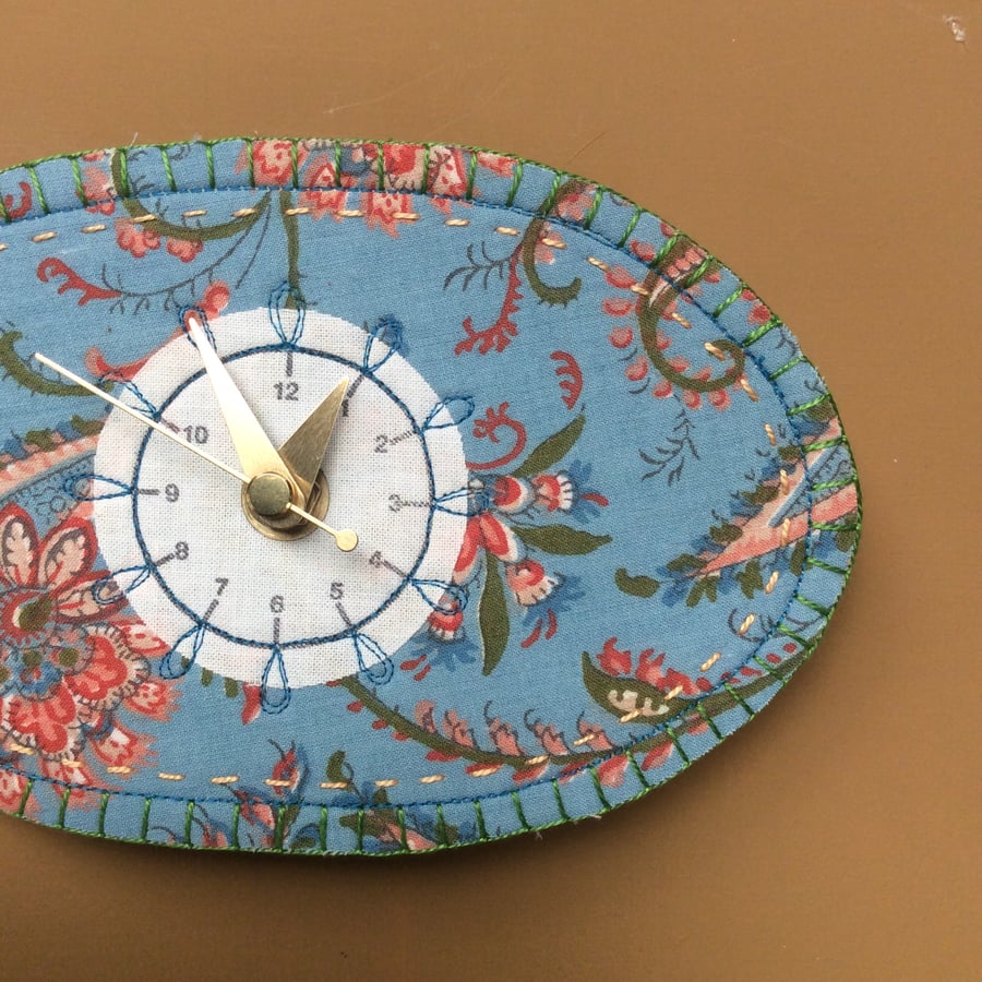 French fabric clock - pale blue landscape