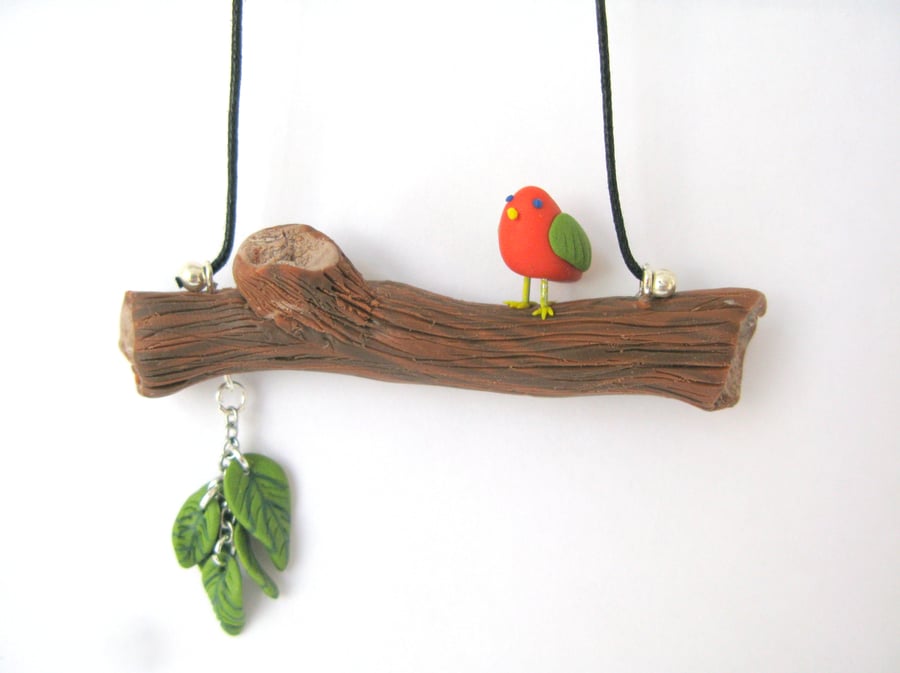 Orange bird on a branch necklace