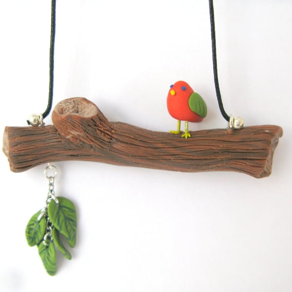 Orange bird on a branch necklace