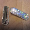 One handmade glass crocodile hair clip - wibbly clear rainbow dots