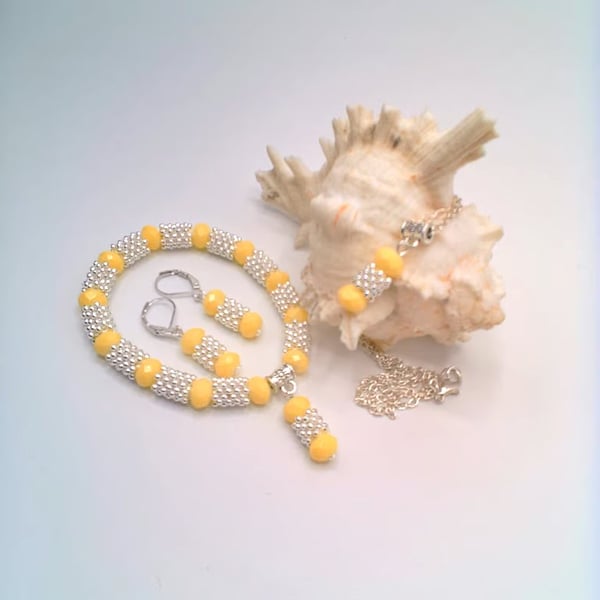 Yellow Faceted Beads and Silver Snowflake Spacers Necklace Bracelet and Earrings