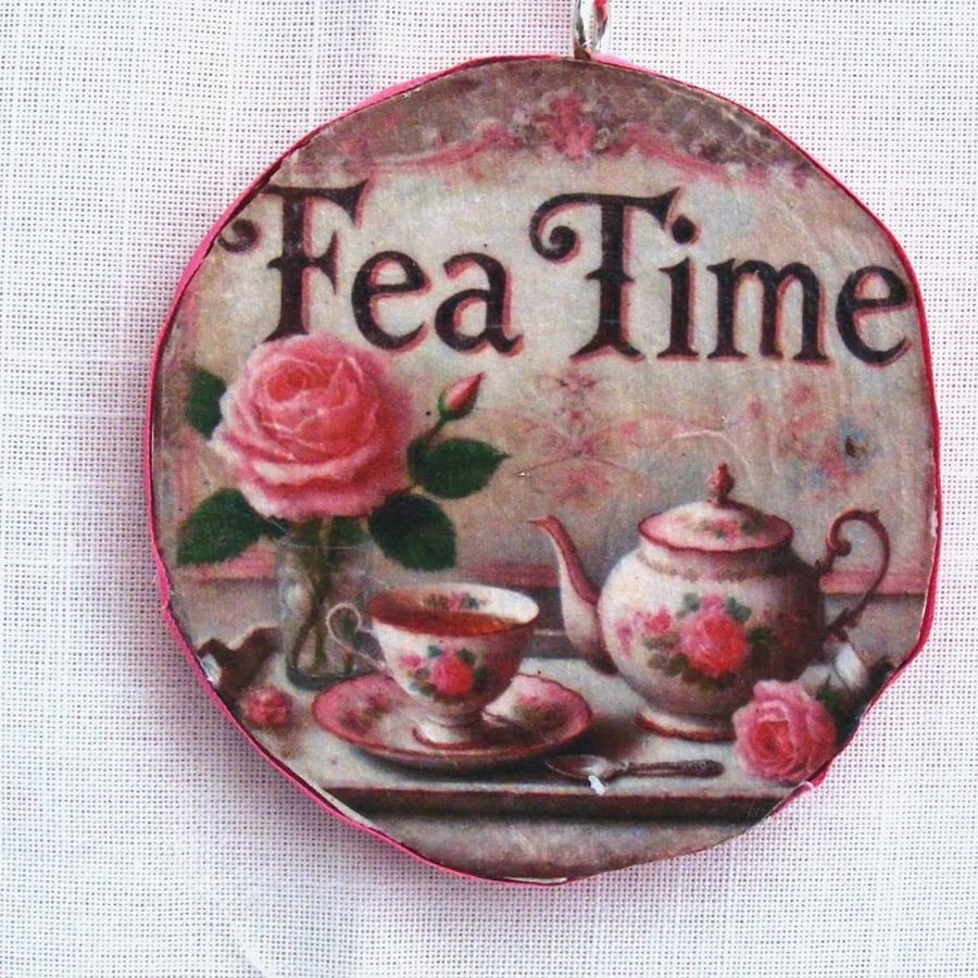 Tea time decoupaged log slice wall decoration.
